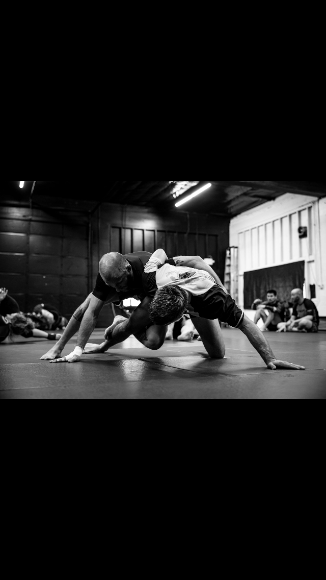 Instructor Sam demonstrating a self-defense technique